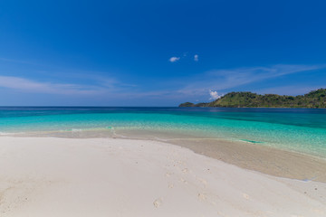 Tropical beach paradise and the blue sky at Khai Island in Satun Province , Thailand