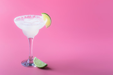 Classic margarita alcohol cocktail with tequila, liqueur, lime juice, sugar syrup, salt and ice,...