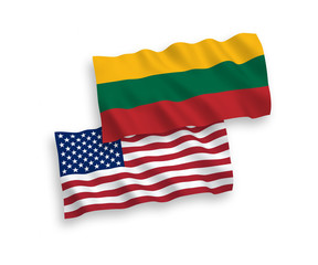 National vector fabric wave flags of Lithuania and America isolated on white background. 1 to 2 proportion.