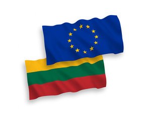 National vector fabric wave flags of Lithuania and European Union isolated on white background. 1 to 2 proportion.