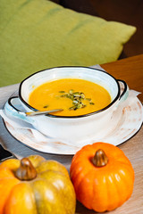 pumpkin cream soup on the table