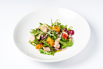 salad with tuna on the white plate
