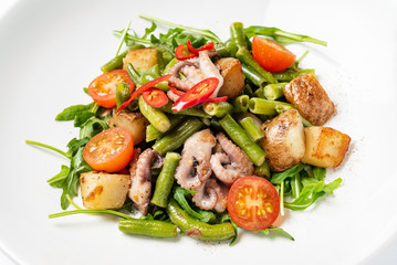 salad with baby octopus and vegetables