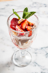 summer dessert with strawberries and ice cream
