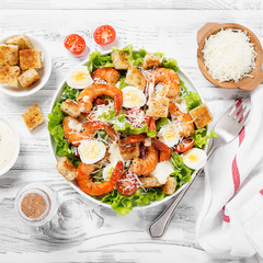 Caesar Salad with Shrimp served with croutons,caesar sauce and parmesan.