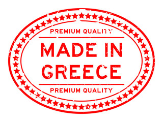 Grunge red premium quality made in Greece oval rubber seal stamp on white background