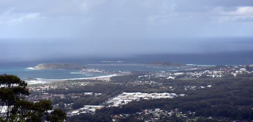 View of Coffs Harbour from Forest Sky Pier, which is a lookout pier with sweeping views on a cloudy...