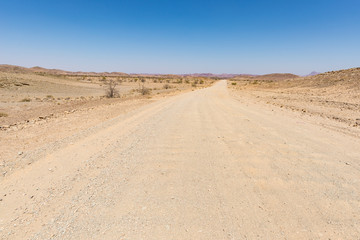 Road trip in the Namib desert, Namib Naukluft National Park, travel destination in Namibia. Travel adventures in Africa.