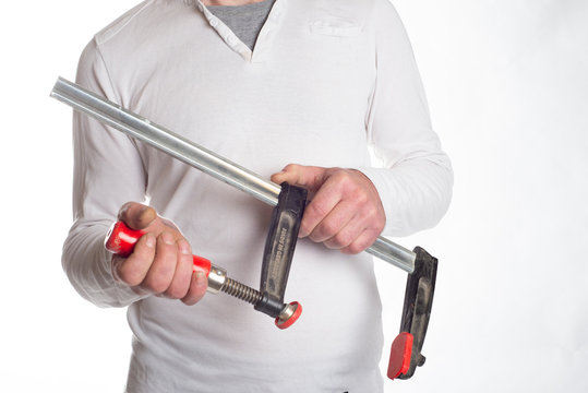 Mann mit Schraubzwinge, Man with screw clamp