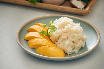 mango with sticky rice - popular traditional dessert of Thailand