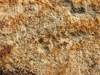 Typical detail of an ancient Italian house wall, made of hand-carved river stones.