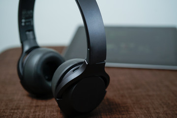 Obraz na płótnie Canvas A close up view of black matte High fidelity wireless headphone