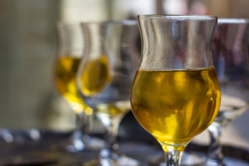 Glasses with an alcohol beverage/ close up detail