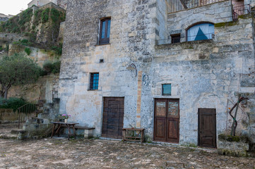 Fototapeta na wymiar Matera, European Capital of Culture 2019. Basilicata, Italy. Detail of houses built on stones.