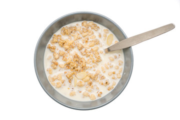 Granola,Almond and oat cereals in a bowl with Full cream milk.Healthy Food for breakfast.