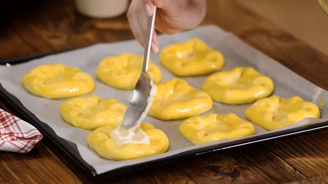 Cooking Of Cheese Yeast Buns. Home bakery