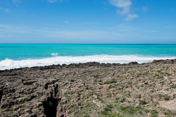 Beautiful azure sea and the rocky beach