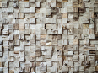 Texture, background and pattern of wooden cubes. Interesting texture of wooden elements