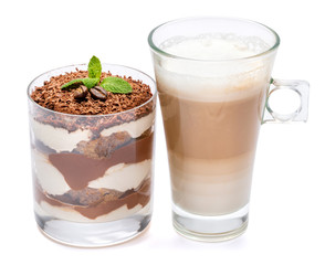 Classic tiramisu dessert in a glass and cup of coffee isolated on a white background with clipping path