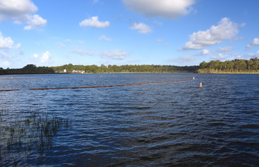 The Ewen Maddock Dam is an earth-fill embankment dam with an un-gated spillway across the Addlington Creek. The main purpose of the dam is for potable water supply of the Sunshine Coast region.