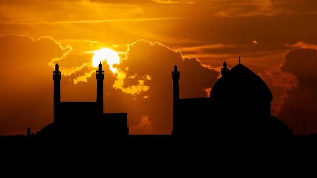The Shah Mosque in Isfahan, Time lapse at Sunset in one of the masterpieces of Persian architecture in the Islamic era, Iran