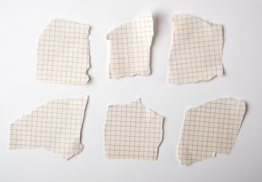 Empty Torn Pieces Of Paper From Notebook To Cell