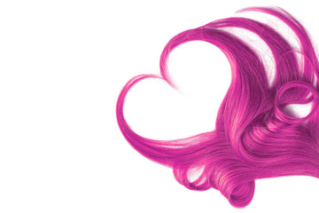 Pink hair in shape of heart, isolated on white background