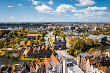 Fototapeta na wymiar Panoramic view of the Holsten Gate in Luebeck, old town and river