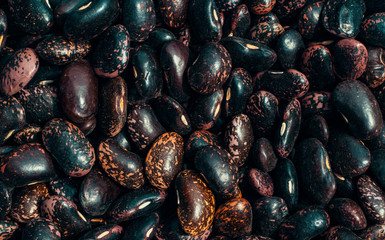 Big black beans with purple spots