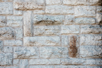 Stone wall. Horizontally-vertical laying of a stone.