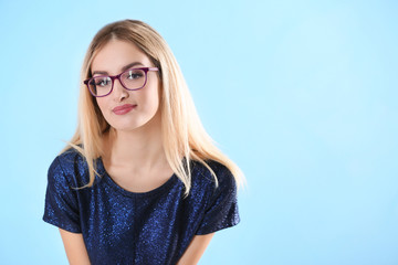 Naklejka premium Portrait of beautiful woman on light background