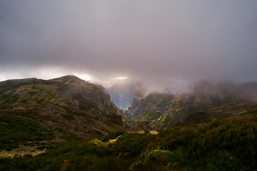 Mountain at sunset with clouds and dramatic light in Madeira,pico de arieiro