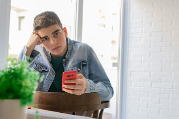 young or teen with mobile phone and computer