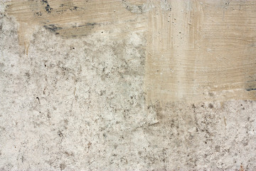 Concrete wall fragment. Old dirty cement texture with defects. Grunge surface with cracks and weathered.