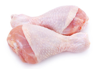 Raw chicken legs on white background