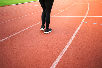 Fototapeta premium female woman exercise running at sport stadium