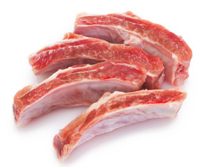 Raw pork ribs on white background