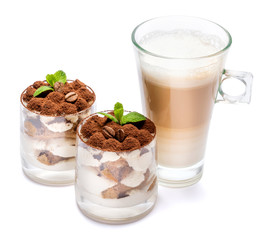 Classic tiramisu dessert in a glass and cup of coffee isolated on a white background with clipping path