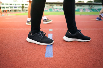 Fototapeta premium female woman exercise running at sport stadium