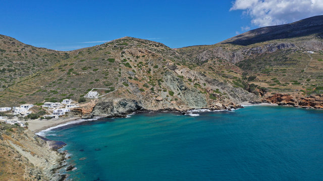 Aerial drone photo of deep turquoise crystal clear sea and rocky sea shore, Folegandros island, Cyclades, Greece