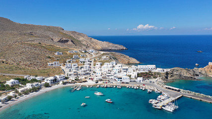 Fototapeta na wymiar Aerial drone photo of Karavostasis picturesque main port of Folegandros island featuring sandy pebble beach, Cyclades, Greece