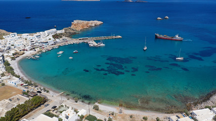 Aerial drone photo of Karavostasis picturesque main port of Folegandros island featuring sandy pebble beach, Cyclades, Greece