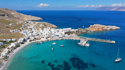 Aerial drone photo of Karavostasis picturesque main port of Folegandros island featuring sandy...
