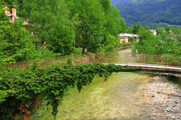 Fototapeta na wymiar View to the River Ischl and a beautiful old bridge, Bad Ischl - Austria