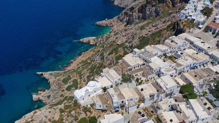 Aerial drone photo of picturesque main village (chora) of Folegandros island featuring uphill...