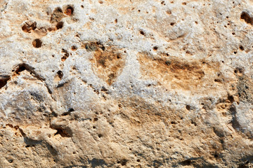 Organic gray yellow and beige stone background in nature