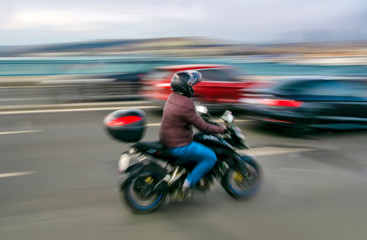Fototapeta na wymiar Motorcycles fast motion on highway side view