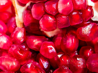 Full frame background of Pomegranate seeds as fruit background