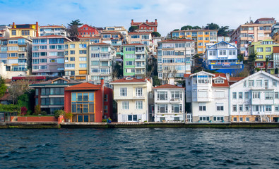 Fototapeta na wymiar Traditional and modern mansions on the Bosporus Strait waterside, Turkey Istanbul