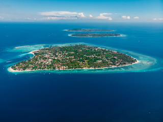 Aerial view with Gili islands and ocean, drone shot. Gili Air, Meno and Trawangan islands
